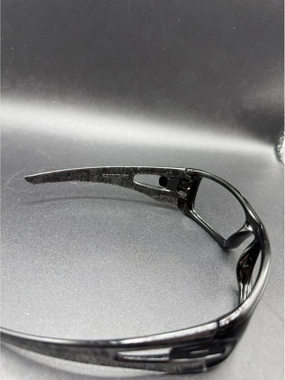 Oakley Crankcase Polished Black/Dark Grey History Text Frame (No Icons)